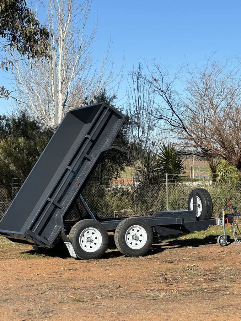 Tandem trailer with tipper in rural setting